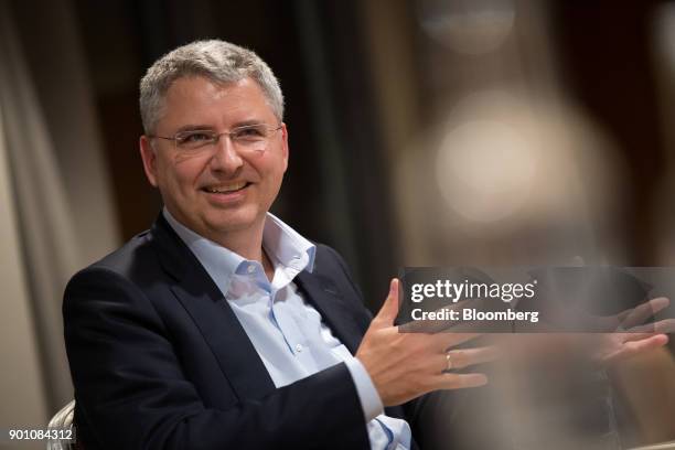 Severin Schwan, chief executive officer Roche Holding AG, gestures as he speaks during an interview in London, U.K., on Wednesday, Dec. 6, 2017....