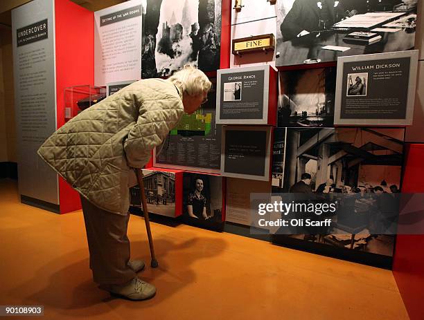 Visitors examine the new exhibition 'Undercover: Life In Churchill's Bunker' in the Cabinet War Rooms Museum on August 27, 2009 in London, England....