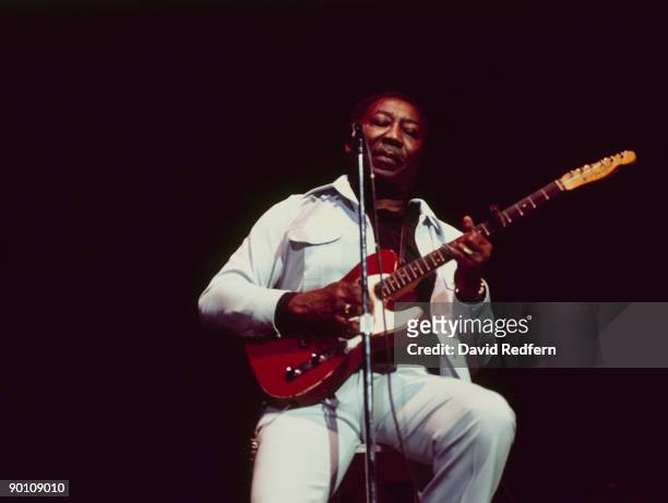 American blues singer and guitarist Muddy Waters performs live on stage playing a Fender Telecaster guitar at the Radio City Music Hall as part of...