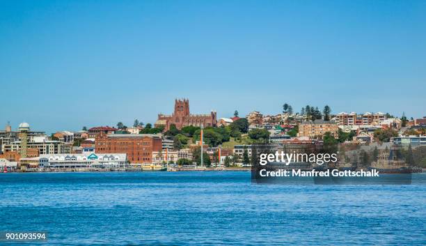 newcastle seen across the hunter river - port stephens stock pictures, royalty-free photos & images