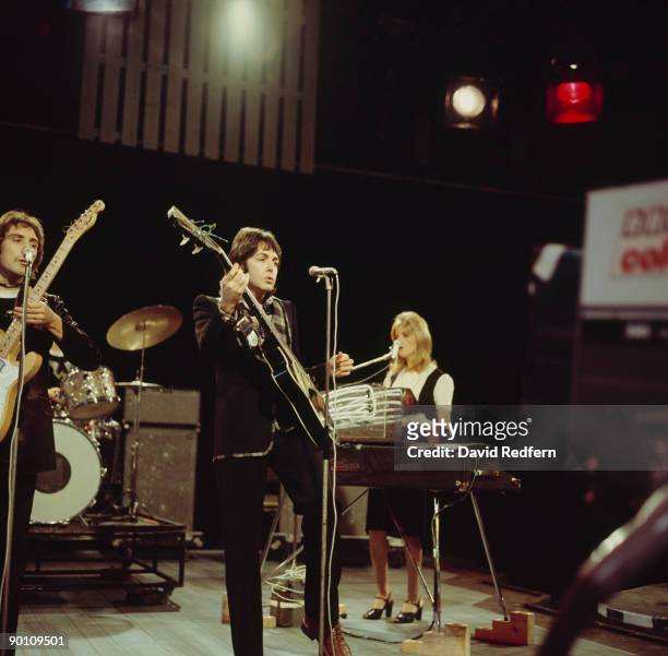 Denny Laine, Paul McCartney and Linda McCartney of Wings perform on Top of the Pops tv show in London, England on November 20, 1974.