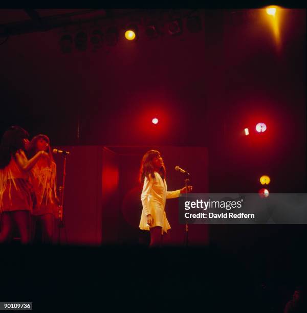 American singer Tina Turner of the Ike & Tina Turner Revue performs live on stage with the Ikettes at the 1970 Newport Jazz Festival in Newport,...