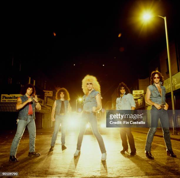 Posed group portrait of rock band Twisted Sister. Left to right are AJ Pero, Mark Mendoza, Dee Snider, Eddie Ojeda and JJ French taken in July 1982.