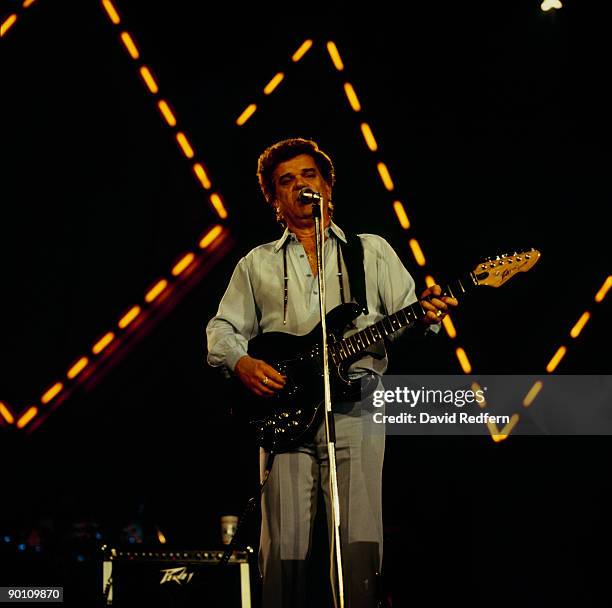 Conway Twitty performs on stage at the Country Music Festival held at Wembley Arena, London in April 1985.