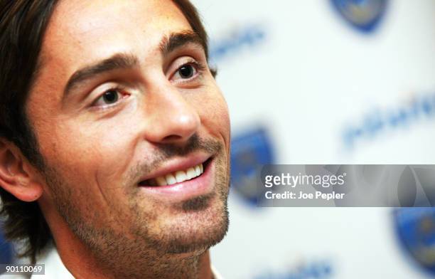 Tommy Smith smiles after signing for Portsmouth FC from Watford in a four year deal, at Fratton Park Portsmouth, August 27, 2009 in Portsmouth,...