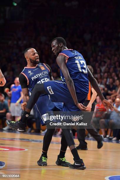 Shannon Shorter and Majok Deng of the Adelaide 36ers celebrate during the round 13 NBL match between the Adelaide 36ers and the Perth Wildcats at...