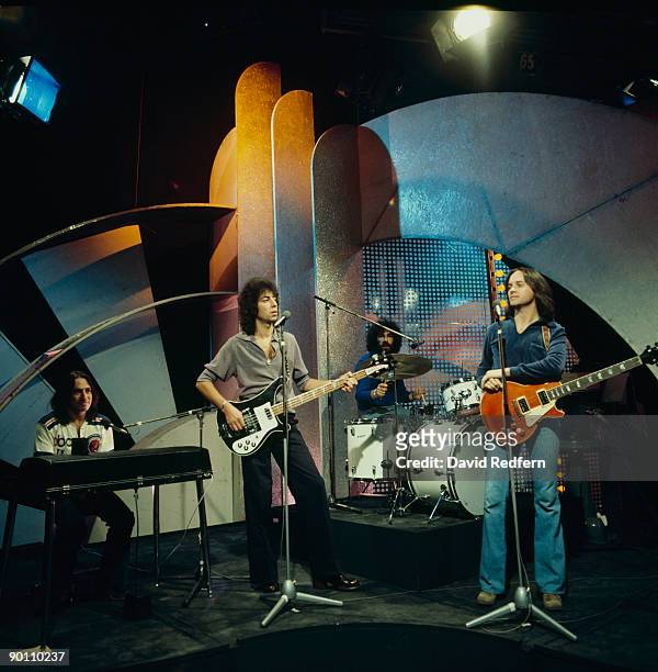 Lol Creme, Graham Gouldman, Kevin Godley and Eric Stewart of 10cc performing 'Rubber Bullets' on Top of the Pops tv show in May 1973.