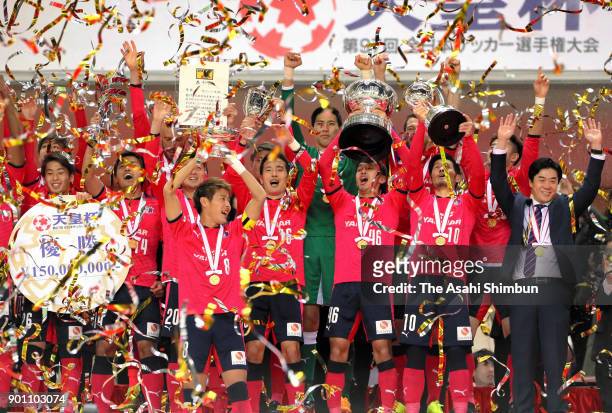Captain Yoichiro Kakitani of Cerezo Osaka lifts the trophy after the 97th Emperor's Cup All Japan Football Championship final between Cerezo Osaka...