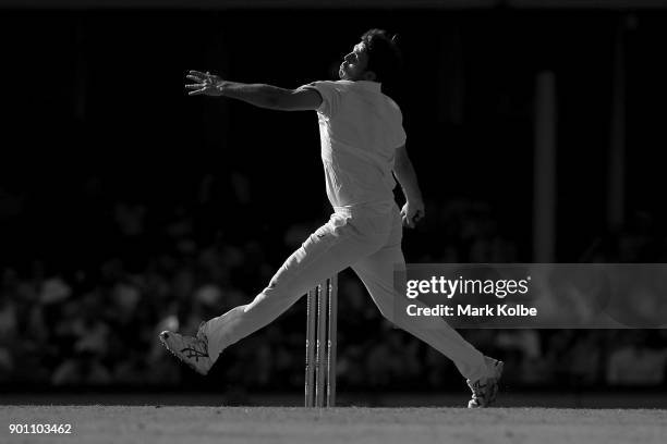 Mitch Marsh of Australia bowls during day one of the Fifth Test match in the 2017/18 Ashes Series between Australia and England at Sydney Cricket...