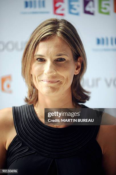 French TV host of the public media group France Television, Claire Fournier poses during a press conference announcing the 2009/2010 TV programs, on...