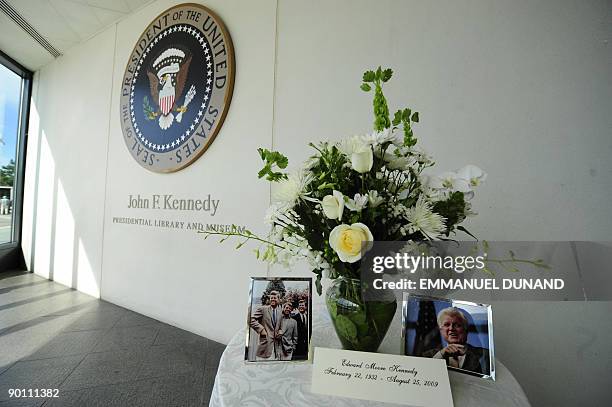 Flower bouquet is placed in memory of the late US Senator Edward Kennedy at the entrance of the John F. Kennedy Presidential Library and Museum where...