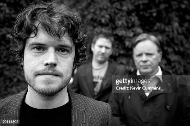 From left to right, Jake Evans, Phil Cunningham and Bernard Sumner at Mottram Hall, Cheshire, to promote their new band, Bad Lieutenant, 21st July...