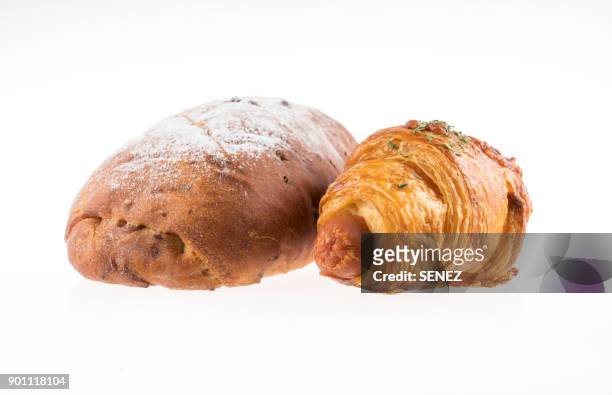 close-up of bread against white background - croissant white background stock-fotos und bilder