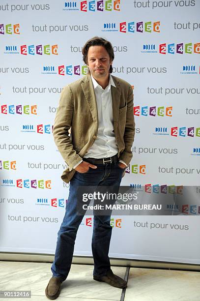 French TV host of the public media group France Television, Arnaud Poivre D'Arvor poses during a press conference announcing the 2009/2010 TV...