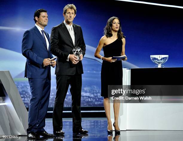 Edwin Van der Sar of Manchester United recieves the club goal keeper of the season award during the UEFA Champions League group stage draw at the...