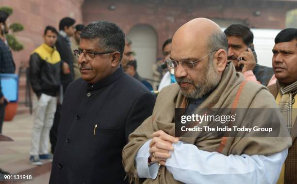 President Amit Shah, IT Minister Ravi Shankar Prasad arrives to attend the BJP Parliamentary Party meeting during the on-going Winter Session of...