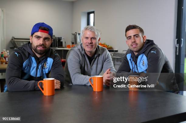 Elliot Lee and Olly Lee of Luton Town pose with their father Rob Lee during the media access day ahead of FA Cup Third Round match against Newcastle...