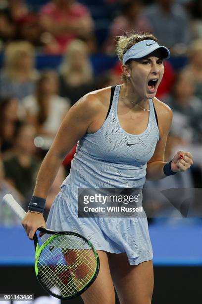 Belinda Bencic of Switzerland celebrates a point in the womens singles match against Coco Vandeweghe of the United States on day six of the 2018...