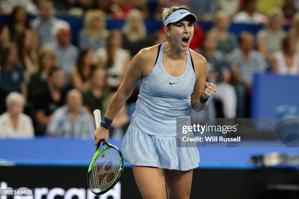 Belinda Bencic of Switzerland celebrates a point in the womens singles match against Coco Vandeweghe of the United States on day six of the 2018...