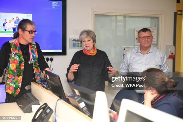 Prime Minister Theresa May with consultant Nick Payne Emergency Sevices Director and Frimley Health CEO Sir Andrew Morris at Frimley Park Hospital on...