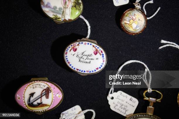 Small gift box, bearing the words "Accept a trifle from a friend", is displayed at the Mayfair Antiques and Fine Arts Fair on January 4, 2018 in...