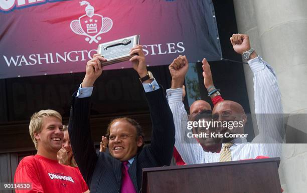 Washington Kastles owner Mark Ein and Washington DC Mayor Adrian Fenty during a press conference at the John A. Wilson Building hold a key to the...