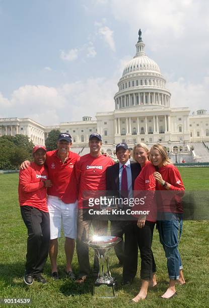 Leander Paes, coach Murphy Jensen, Scott Oudseme, Washington Kastles owner Mark Ein, Rennae Stubbs and Olga Puchkova pose for a photo outside the US...