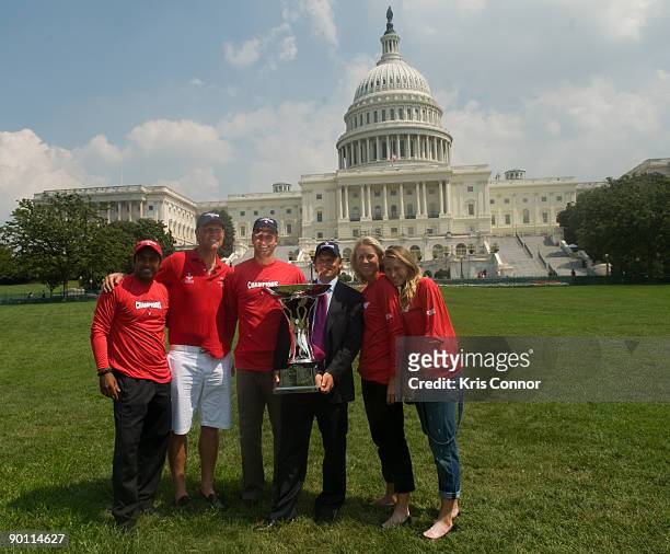 Leander Paes, coach Murphy Jensen, Scott Oudseme, Washington Kastles owner Mark Ein, Rennae Stubbs and Olga Puchkova pose for a photo outside the US...