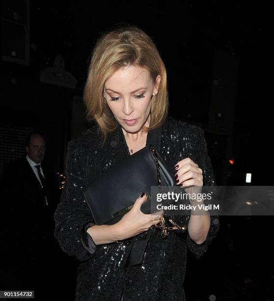 Kylie Minogue leaves Guinea Grill pub after a few drinks with Stella McCartney after her annual in-store Christmas lights party on November 26, 2014...