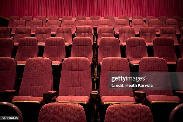 empty chairs in movie theater. - kinositz stock-fotos und bilder