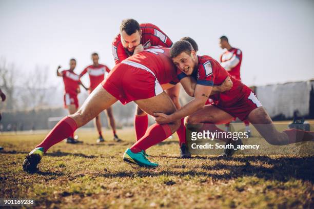 exercises before game - tackling stock pictures, royalty-free photos & images
