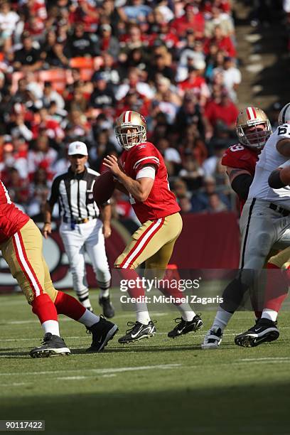 Alex Smith of the San Francisco 49ers passes the ball during a pre-season game against the Oakland Raiders on August 22, 2009 at Candlestick Park in...