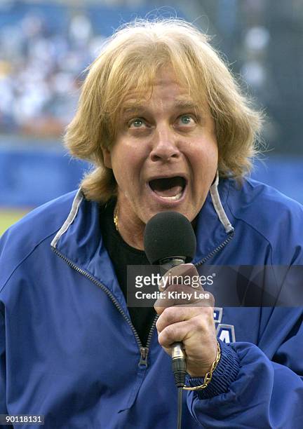 Eddie Money sings the national anthem before the Los Angeles Dodgers game against the Florida Marlins at Dodger Stadium in Los Angeles, Calif. On...