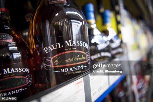 Bottles of Constellation Brands Inc. Paul Mason brandy sit on display for sale inside a BevMo Holdings LLC store in Walnut Creek, California, U.S.,...