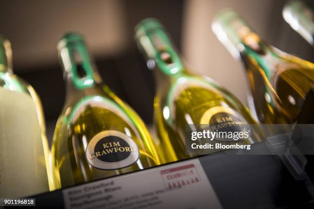 Bottles of Constellation Brands Inc. Kim Crawford Sauvignon Blanc wine sit on display for sale inside a BevMo Holdings LLC store in Walnut Creek,...