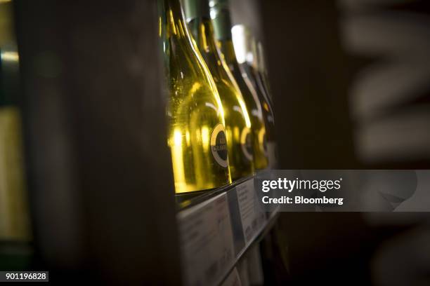 Bottles of Constellation Brands Inc. Kim Crawford Sauvignon Blanc wine sit on display for sale inside a BevMo Holdings LLC store in Walnut Creek,...