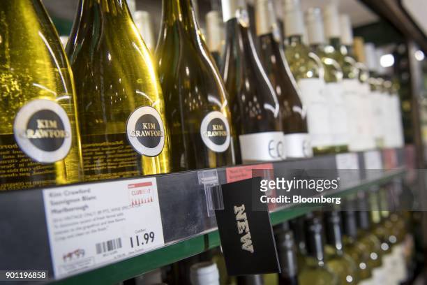 Bottles of Constellation Brands Inc. Kim Crawford Sauvignon Blanc wine sit on display for sale inside a BevMo Holdings LLC store in Walnut Creek,...