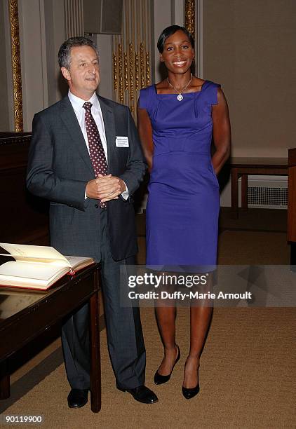 And executive vice president of NYSE Michael Geltzeiler and tennis player Venus Williams visit the New York Stock Exchange on August 27, 2009 in New...