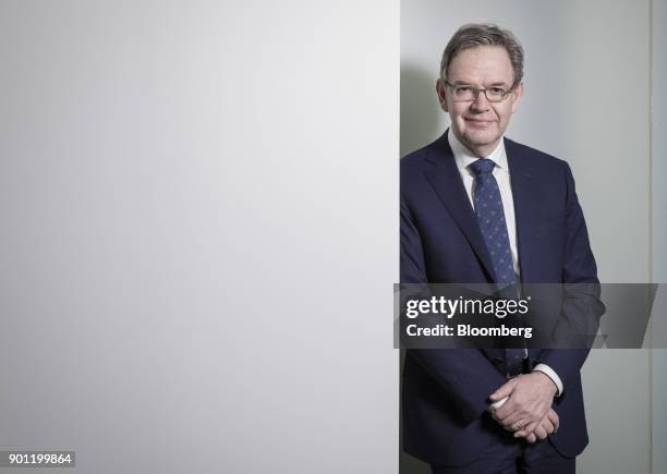 Steven Maijoor, chairman of the European Securities and Markets Authority , poses for a photograph ahead of a Bloomberg Television interview in...