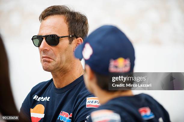Alberto Puig of Spain and Repsol Honda Team looks on during the Kick Start Celebration in Red Bull Energy Station in downtown Indianpolis on August...