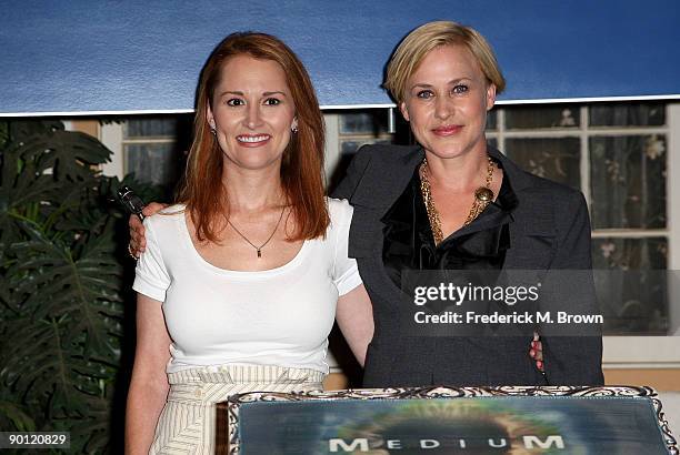 Allison Dubois and actress Patricia Arquette attend the 100th episode cake cutting celebration at Raleigh Studios on August 27, 2009 in Manhattan...