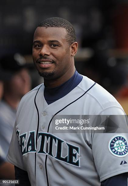Ken Griffey Jr. #24 of the Seattle Mariners looks on from the dugout against the Detroit Tigers during the game at Comerica Park on August 19, 2009...