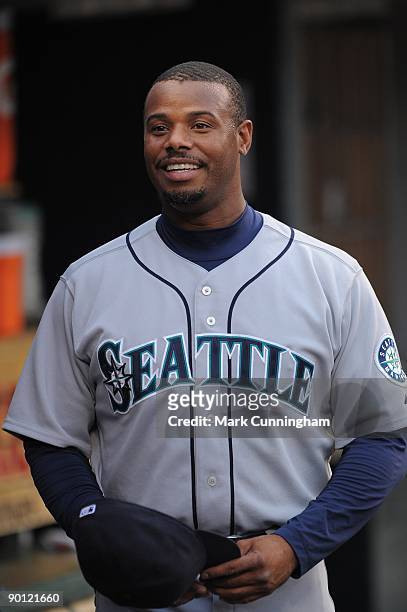 Ken Griffey Jr. #24 of the Seattle Mariners looks on from the dugout against the Detroit Tigers during the game at Comerica Park on August 19, 2009...