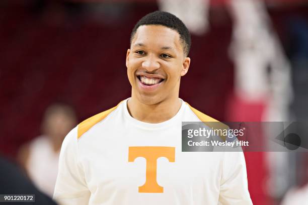Grant Williams of the Tennessee Volunteers warms up before a game against the Arkansas Razorbacks at Bud Walton Arena on December 30, 2017 in...