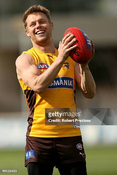 Sam Mitchell takes the ball during a Hawthorn Hawks AFL training session at Waverley Park on August 28, 2009 in Melbourne, Australia.