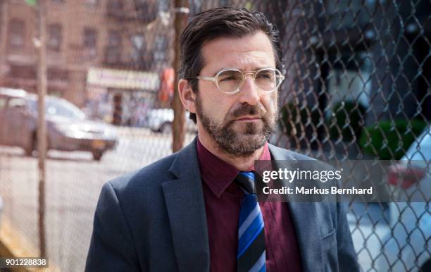 businessman walking in the street. - dark haired man gray shirt with wine stock pictures, royalty-free photos & images