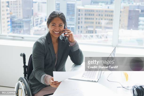 businesswoman with disability - philippines women stock pictures, royalty-free photos & images