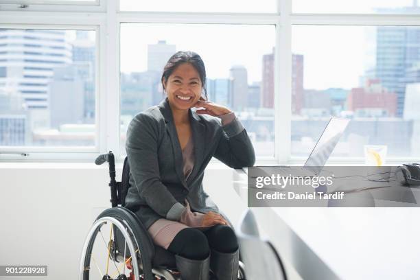 businesswoman with disability - toothy smile stock pictures, royalty-free photos & images