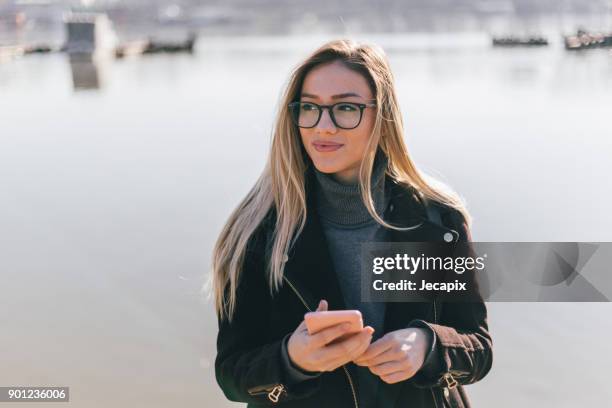 beauty and the river - eyeglasses winter stock pictures, royalty-free photos & images