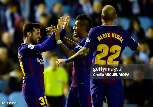 Barcelona's Spanish forward Jose Arnaiz celebrates a goal with teammates during the Spanish Copa del Rey football match RC Celta de Vigo vs FC...